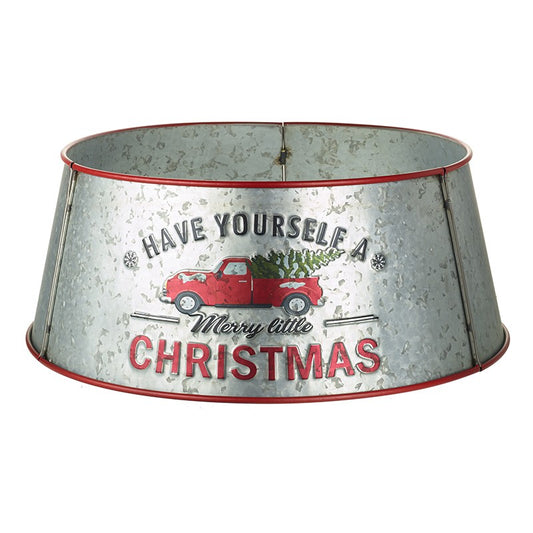 Silver metal tree skirt with red trim on the top and bottom.  Image of a red truck with a tree in the trunk, with the wording Have Yourself A Merry little Christmas written across.