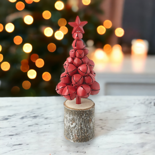 Red Metal Christmas Bells Tree on Wooden Log